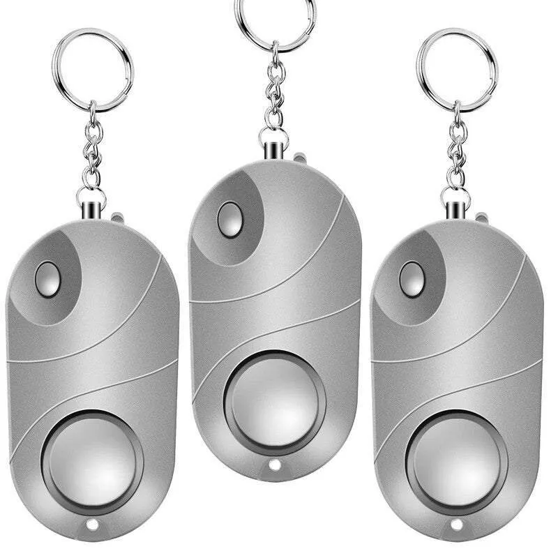 Personal alarm keychain with 130dB sound and LED flashlight in pink colour