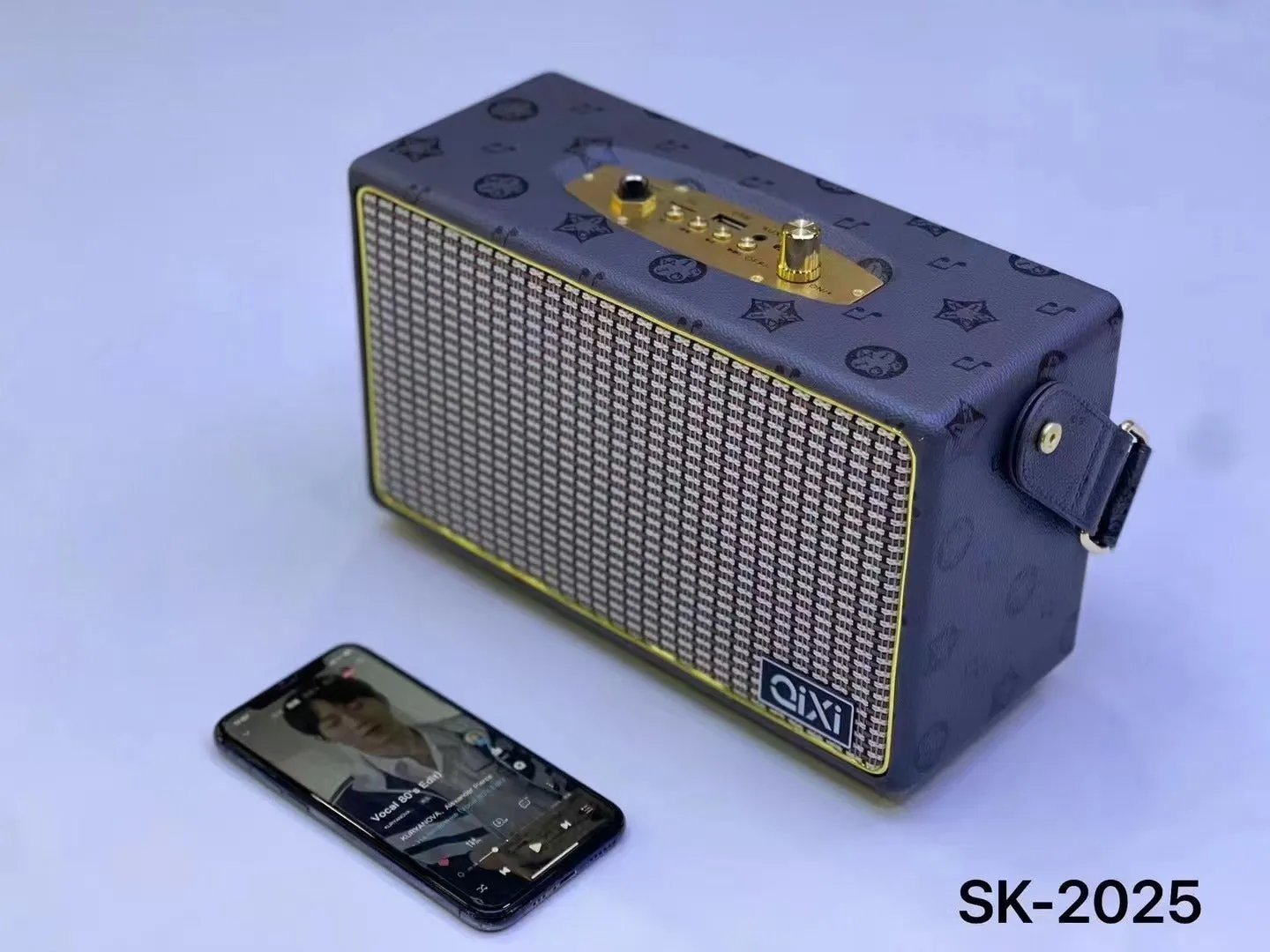 Red leather pattern mini portable Bluetooth speaker card design with dual speakers and microphone option