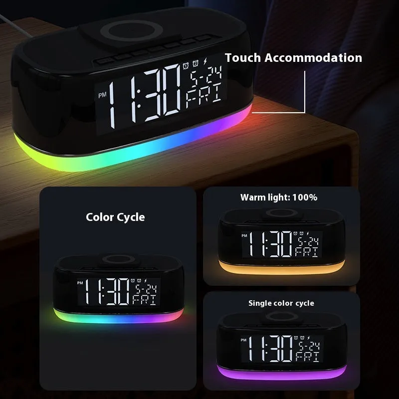 Deep black Bluetooth audio subwoofer with wireless charging pad and colourful light display