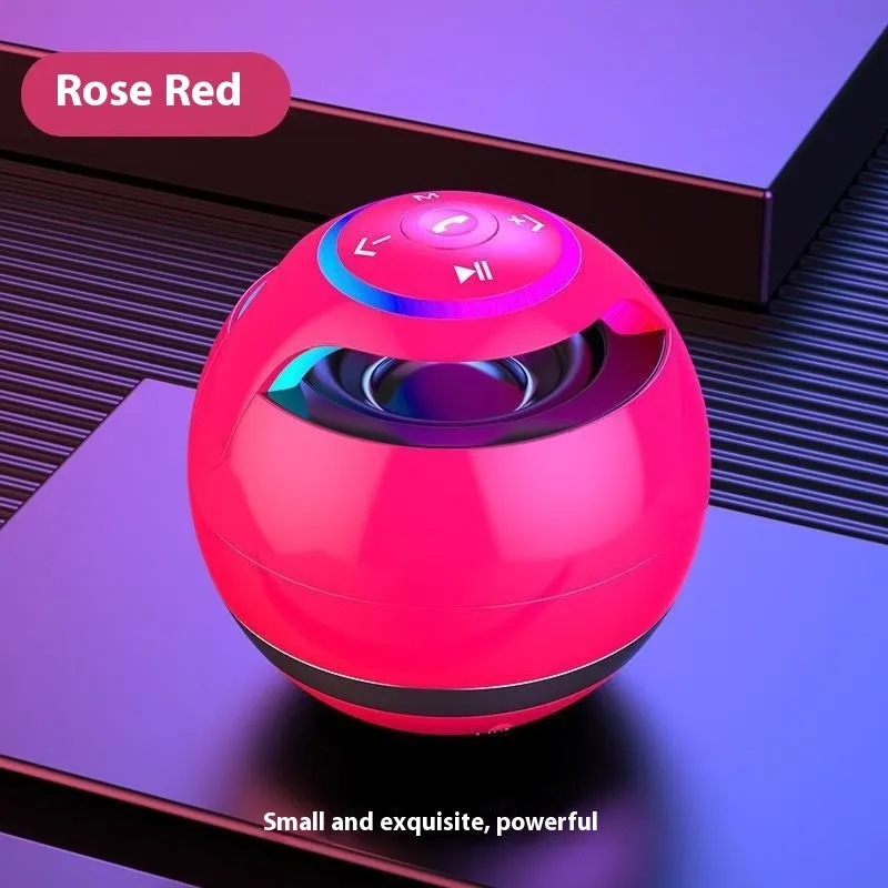 Mini Bluetooth speaker in black with dynamic bass boost and card insertion, suitable for portable outdoor use