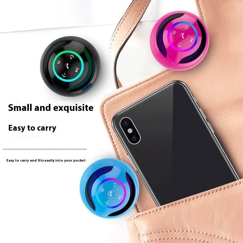 Mini Bluetooth speaker in black with dynamic bass boost and card insertion, suitable for portable outdoor use