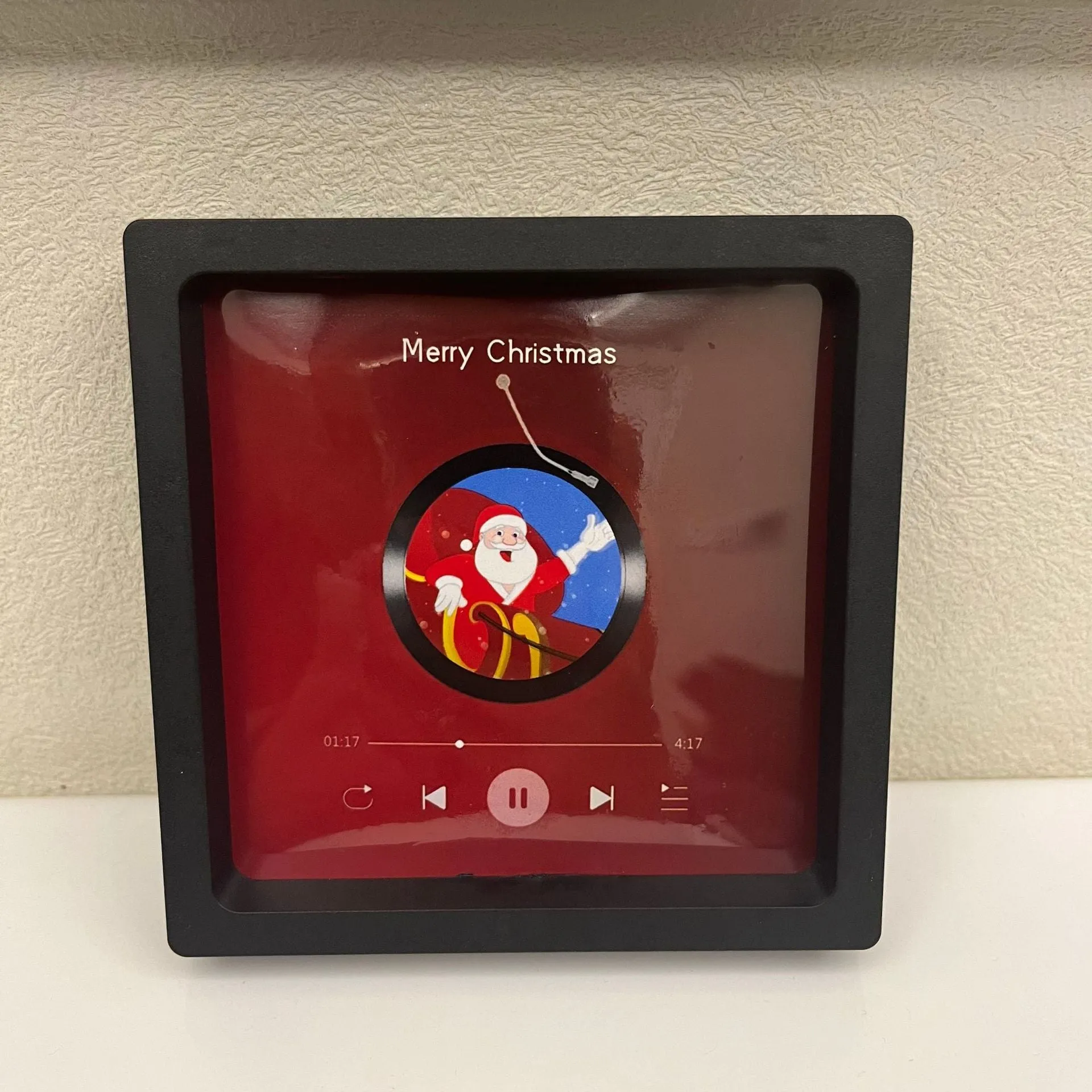 Christmas acrylic music box refrigerator magnet with festive design on a white background