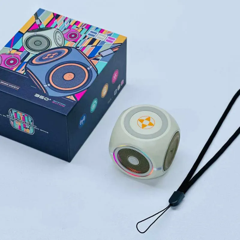 Decompression rotating gyro bass Bluetooth speaker in black with LED light on outdoor surface