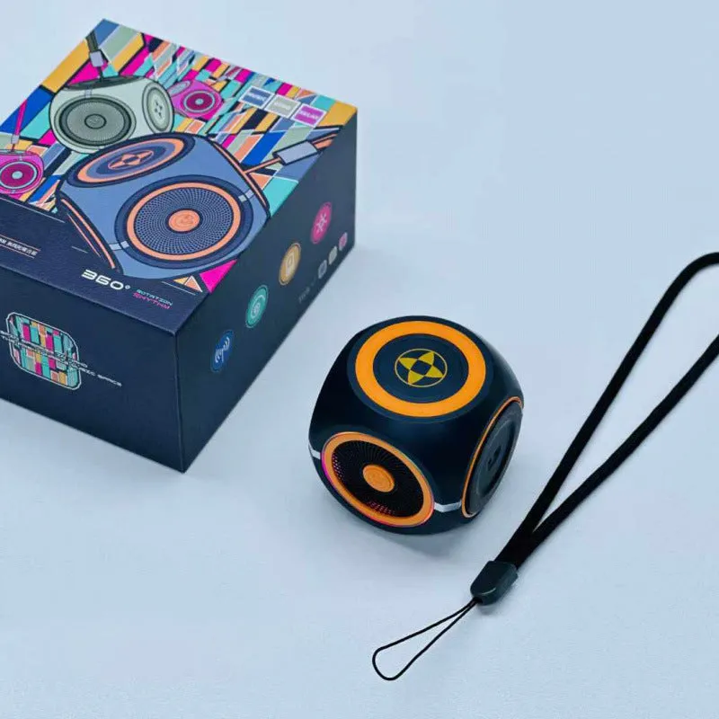 Decompression rotating gyro bass Bluetooth speaker in black with LED light on outdoor surface