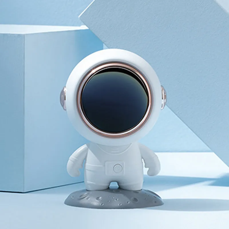 Spaceman Bluetooth speaker in moon astronaut design on desktop