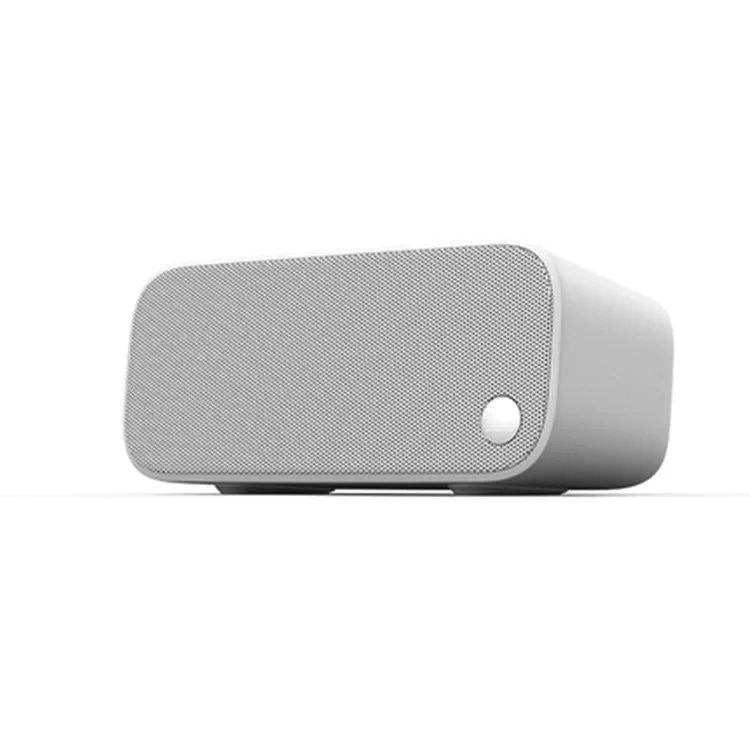Elf Sugar Cube AI Wi-Fi speaker set in blue, green, red, or white colours for bookshelf placement