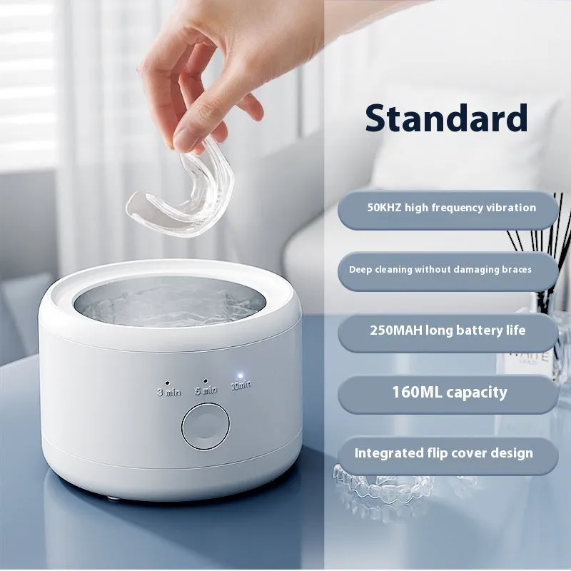 White ultrasonic tooth socket cleaning machine with 300ml tank, third gear timing, and 3-step thermostat on countertop