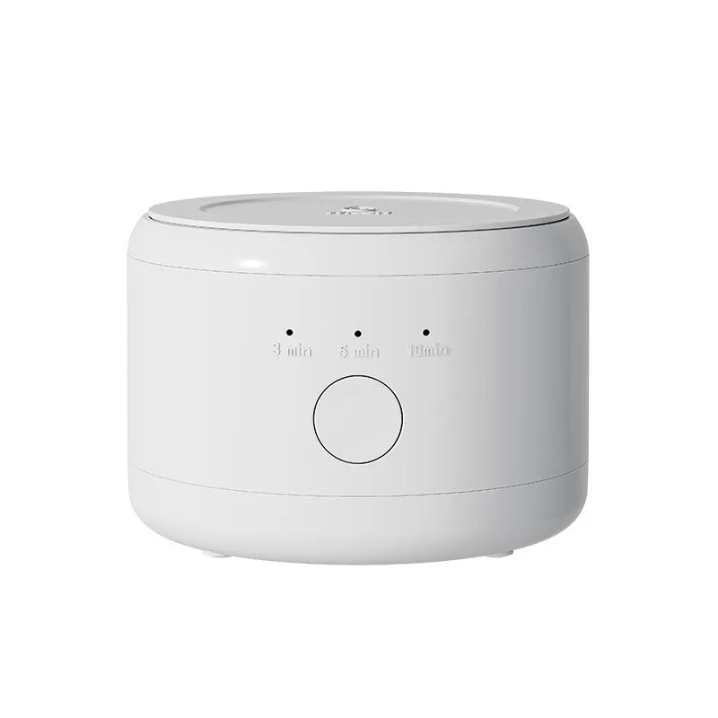 White ultrasonic tooth socket cleaning machine with 300ml tank, third gear timing, and 3-step thermostat on countertop