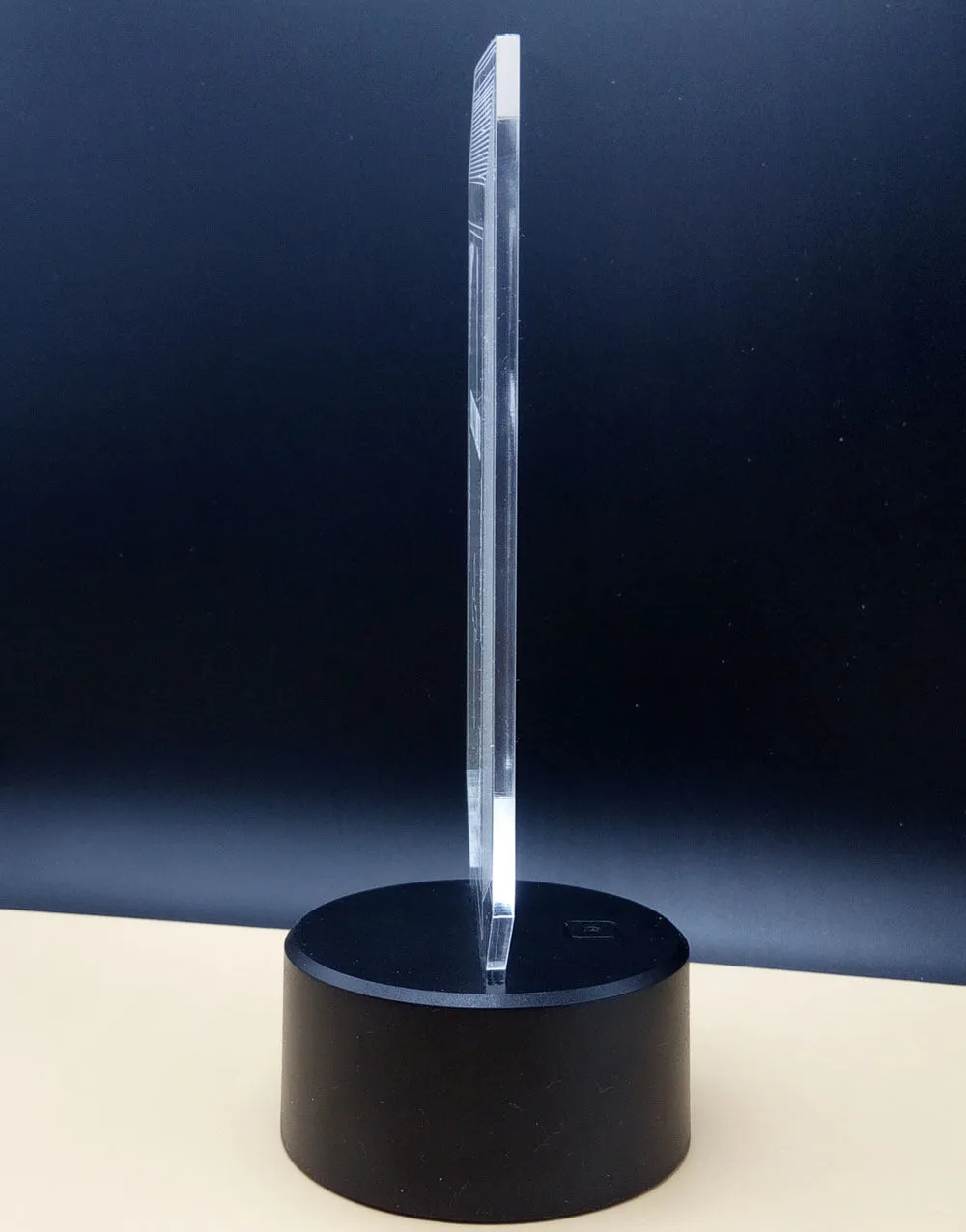 3D rose flower design night light showing colour-changing LEDs on acrylic panel with black ABS base.