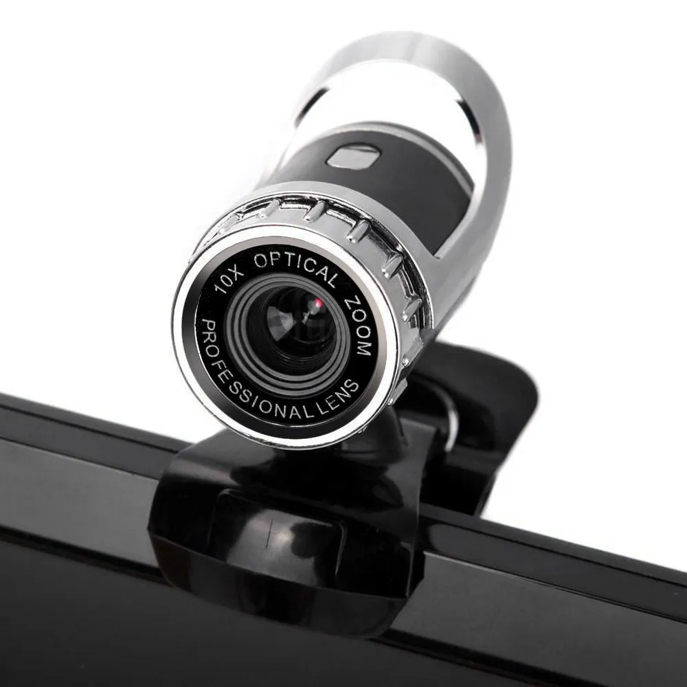 Black and silver USB computer camera with 480p HD glass lens and built-in microphone on a desk