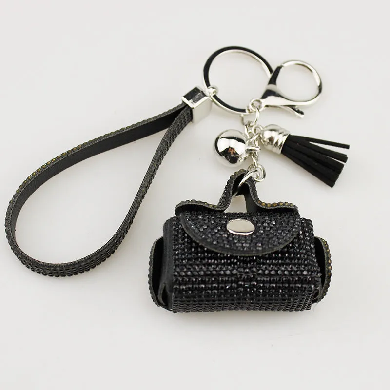 Leather diamond coin purse earphone bag in black with zip closure and keychain pendant