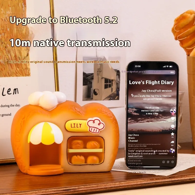 White ABS bakery Bluetooth speaker with glowing creative ornament design