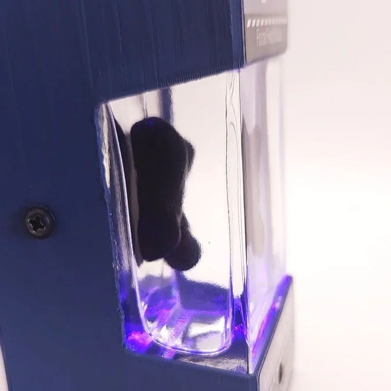 Magnetic fluid music visualisation light with black fluid and white LED, wooden shell, 95x60x63mm