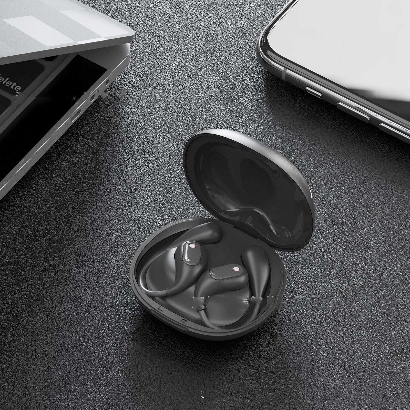 Open Bluetooth bone conduction headset in black with earhook design, Jerry chip, and waterproof build