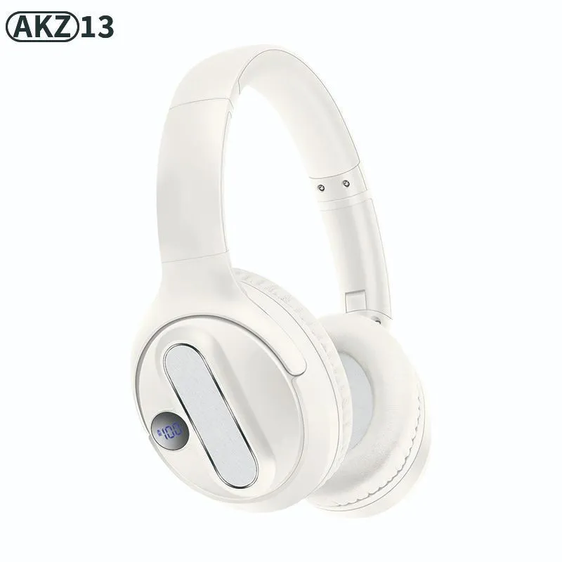 Retro wireless Bluetooth earphones with orange plastic shell, foldable headband, and digital display