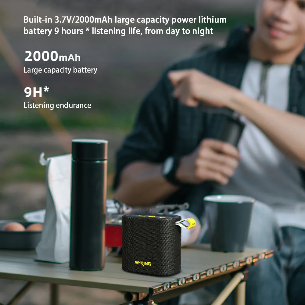 Black portable Bluetooth speaker with compact waterproof design, shown front view