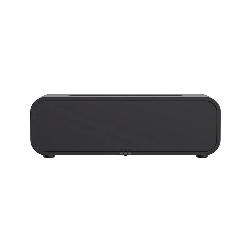 Black and white aromatherapy diffuser with flame LED effect and remote control on wooden surface