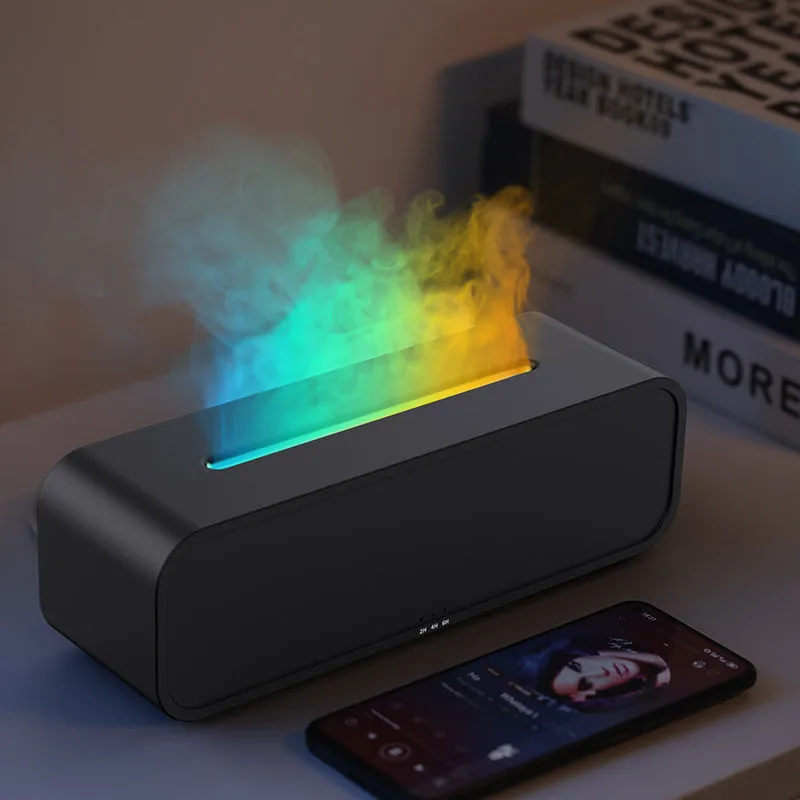 Black and white aromatherapy diffuser with flame LED effect and remote control on wooden surface