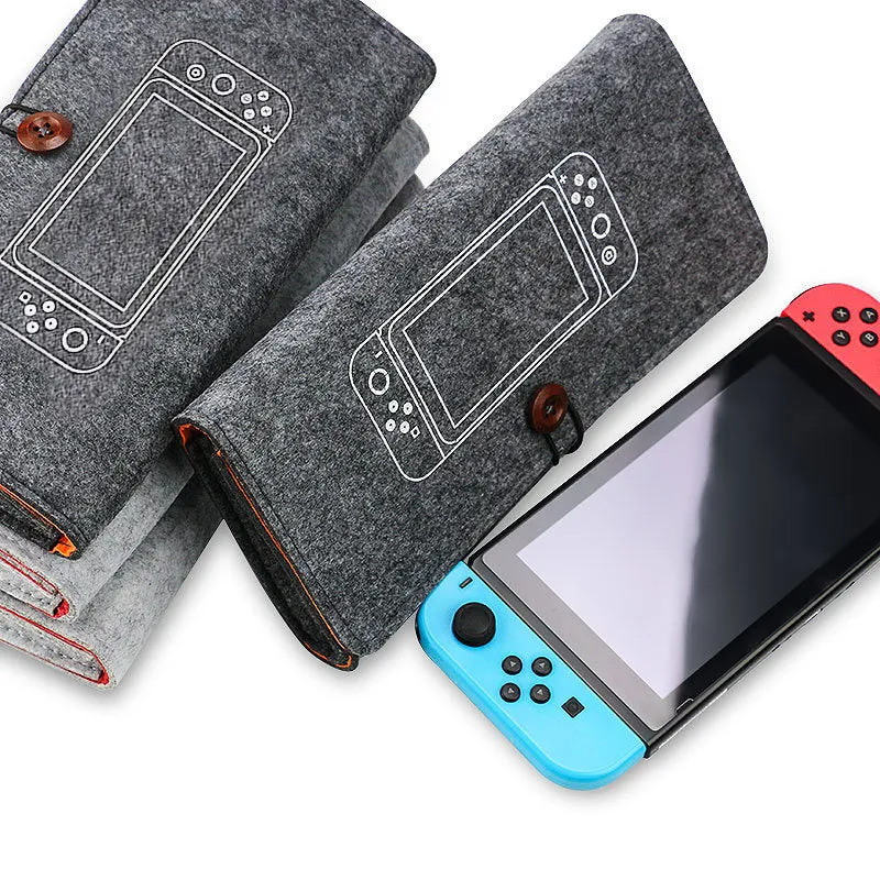 Black felt pouch for Nintendo Switch open to show console compartment and 5 game card slots.