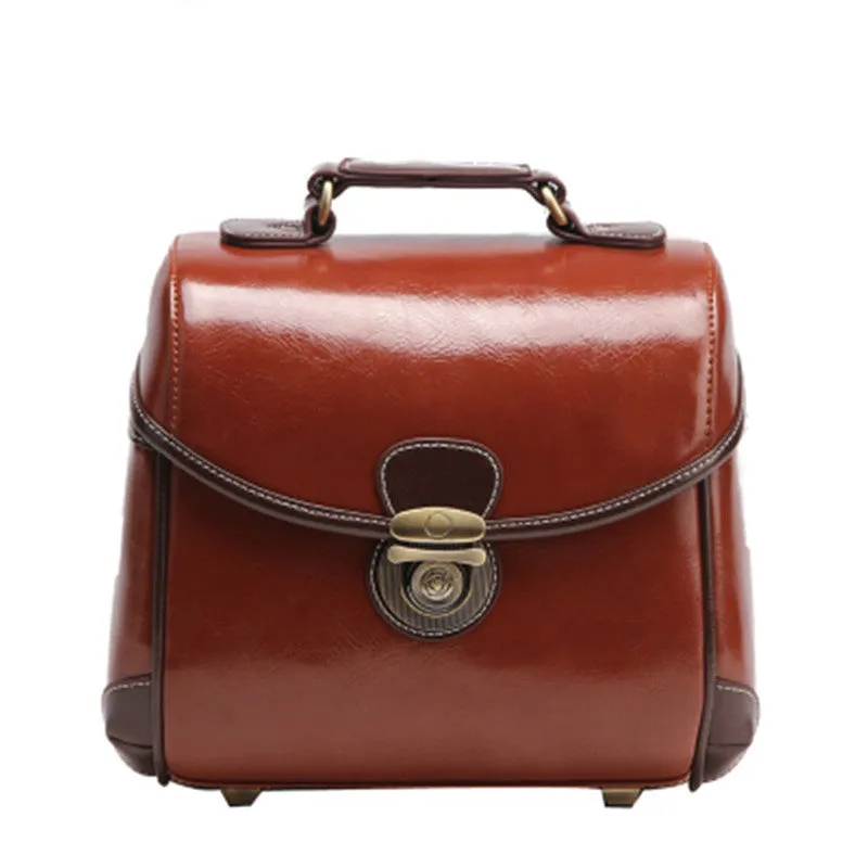 Fashion single shoulder SLR camera liner bag in PU leather, small size, dark coffee colour, for home storage.