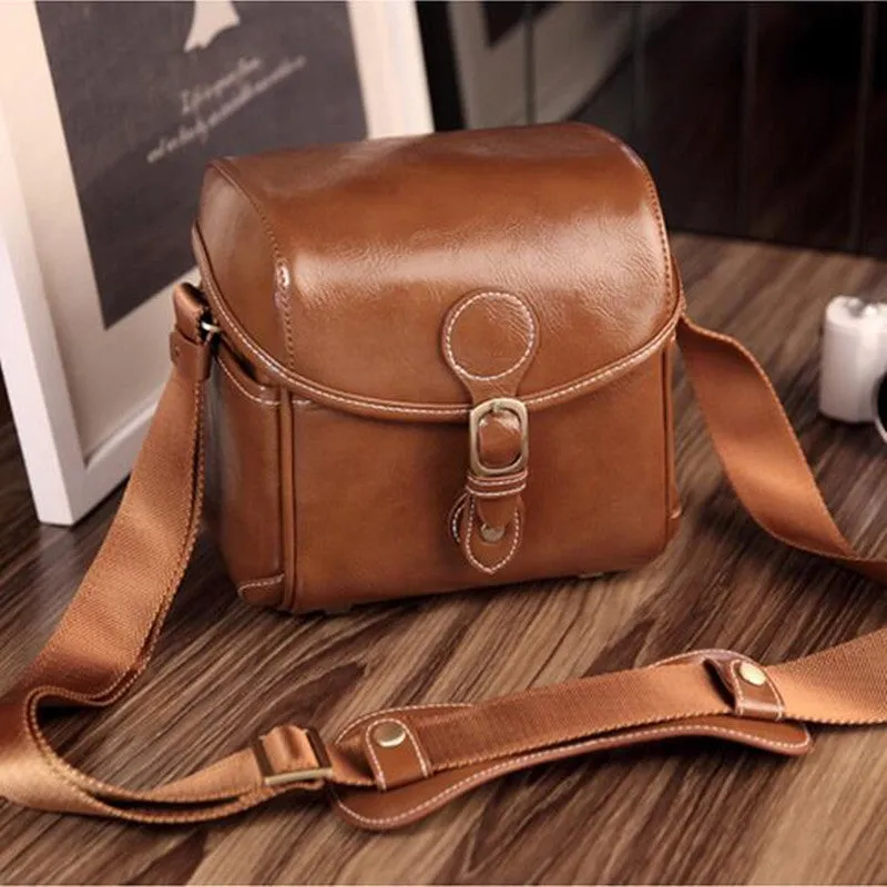 Fashion single shoulder SLR camera liner bag in PU leather, small size, dark coffee colour, for home storage.