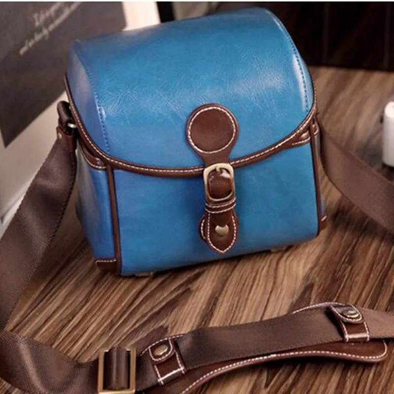 Fashion single shoulder SLR camera liner bag in PU leather, small size, dark coffee colour, for home storage.