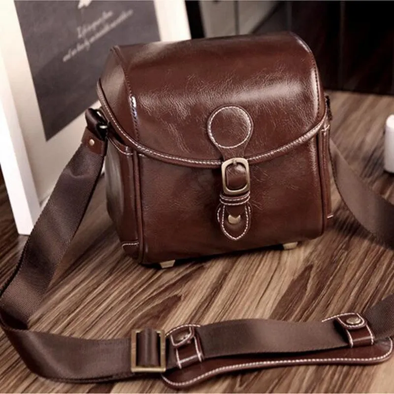 Fashion single shoulder SLR camera liner bag in PU leather, small size, dark coffee colour, for home storage.