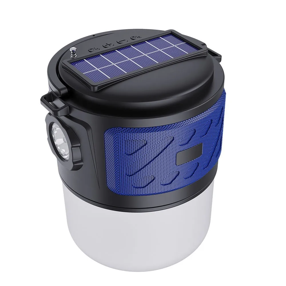 Portable solar camping lantern speaker with Bluetooth, LED light, USB rechargeable, black colour, on outdoor lawn