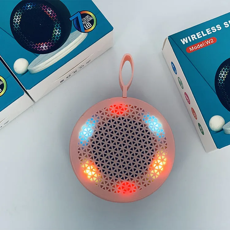 Pink mini Bluetooth speaker with plastic shell and button controls, 82x82x40mm