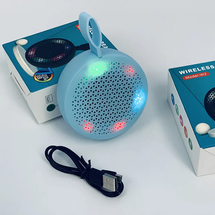 Pink mini Bluetooth speaker with plastic shell and button controls, 82x82x40mm