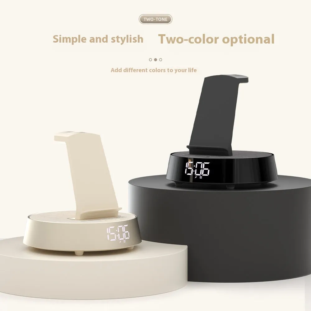 Wireless Bluetooth speaker alarm clock with phone holder in creamy-white colour on a wooden bedside table