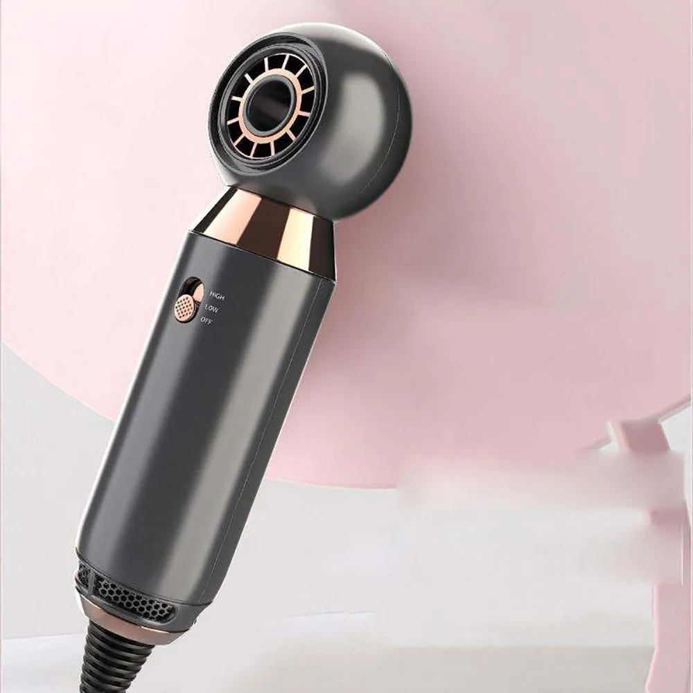 Compact white hair dryer with concentrator attachment measuring 20cm long