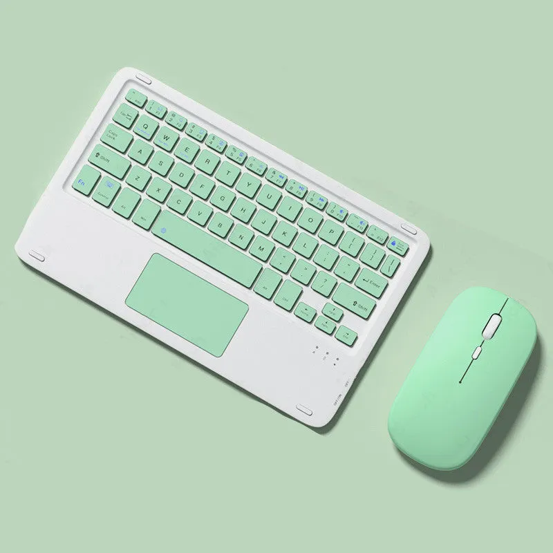 Pink Bluetooth touch keyboard and mute wireless mouse combo with USB charging cable on white background