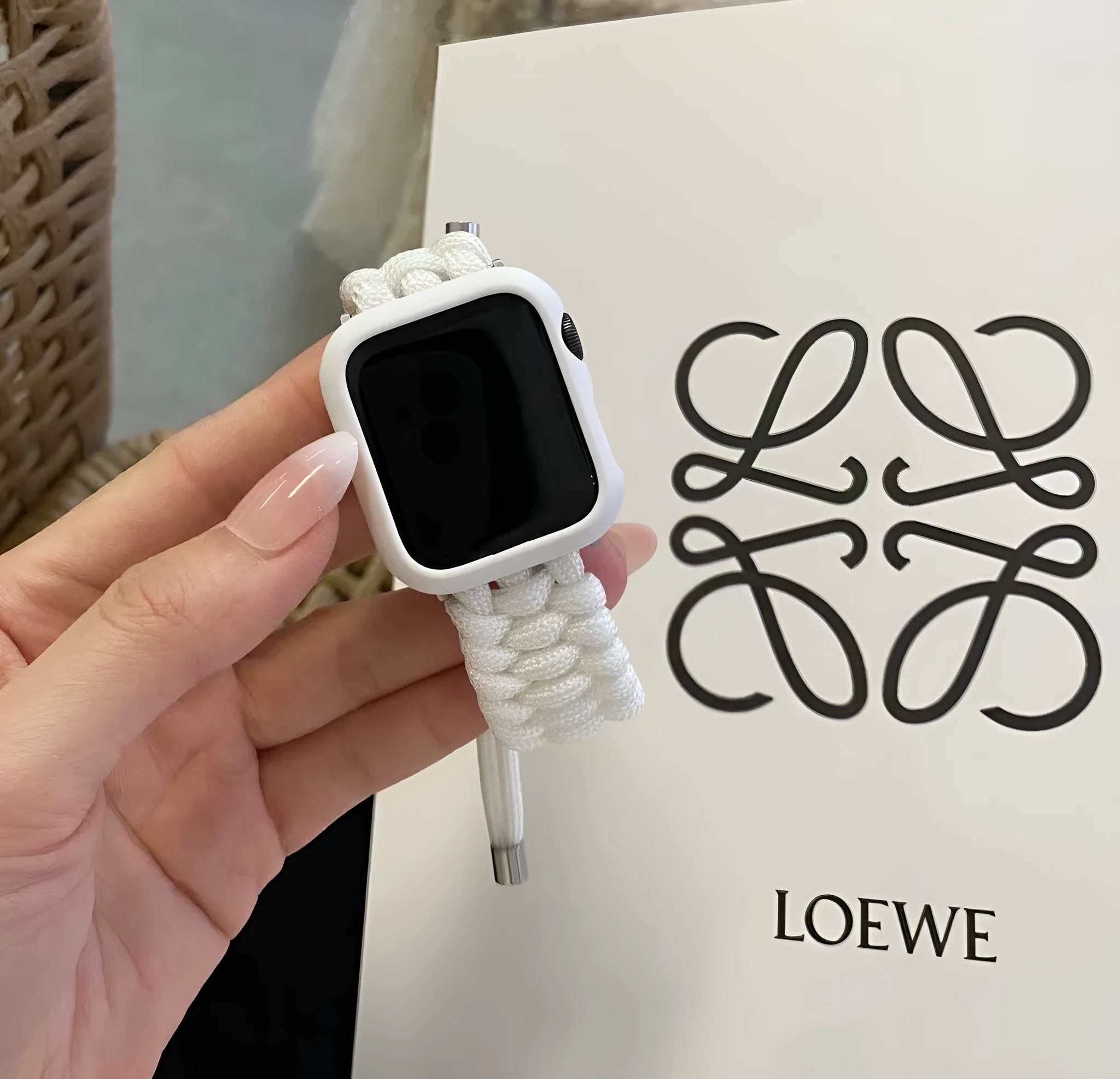 Black paracord braided smartwatch strap with buckle for Apple Watch and Samsung Huawei models.