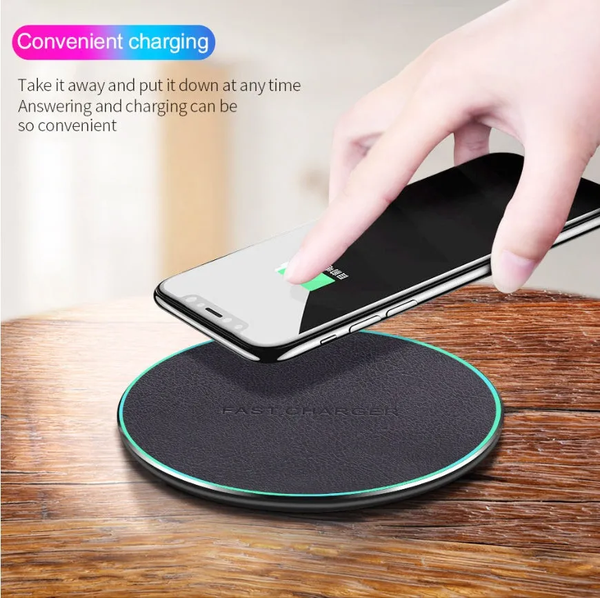 Black circular Qi wireless charging pad for iPhone 11 with LED light indicator