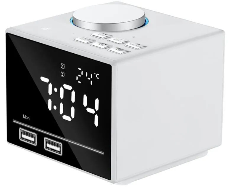 Bluetooth speaker alarm clock with colourful ambient light, LED mirror display, and dual USB ports on a nightstand