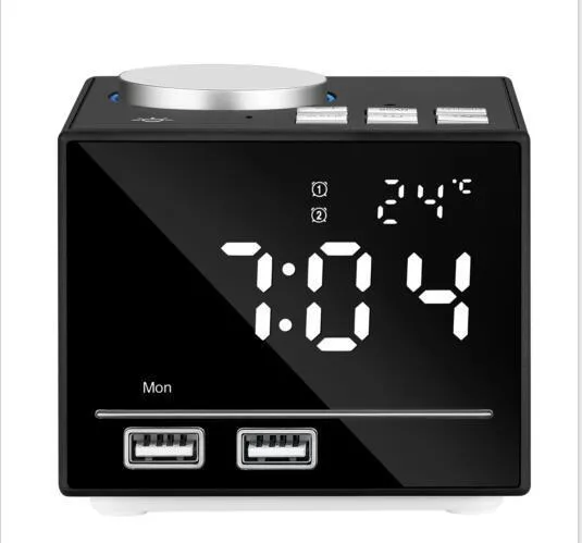 Bluetooth speaker alarm clock with colourful ambient light, LED mirror display, and dual USB ports on a nightstand