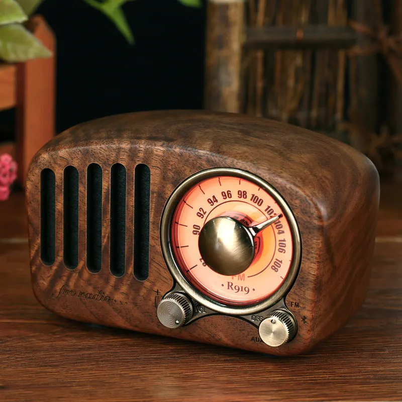 Retro wooden wireless mini speaker in cherry wood finish showing compact dimensions