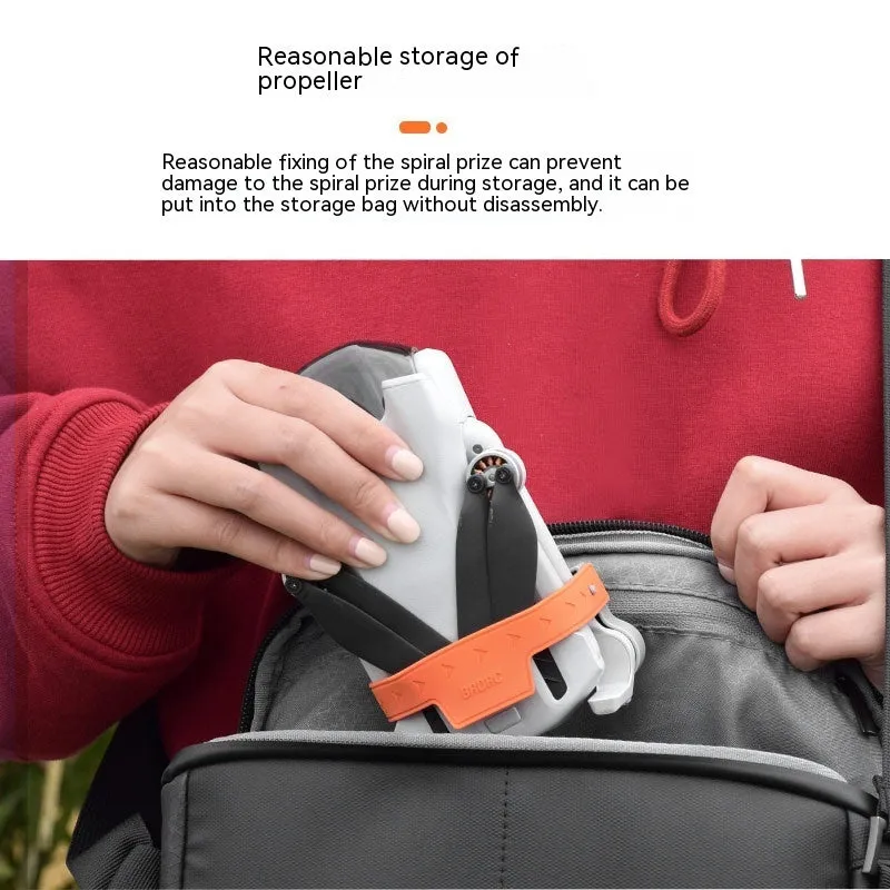 Paddle binding device silicone ABS clip in grey on a kayak paddle blade