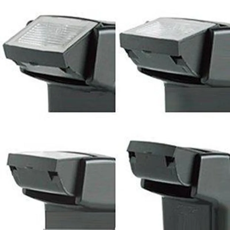 Compact silver SLR camera flash with tilted head mounted on a camera hot shoe