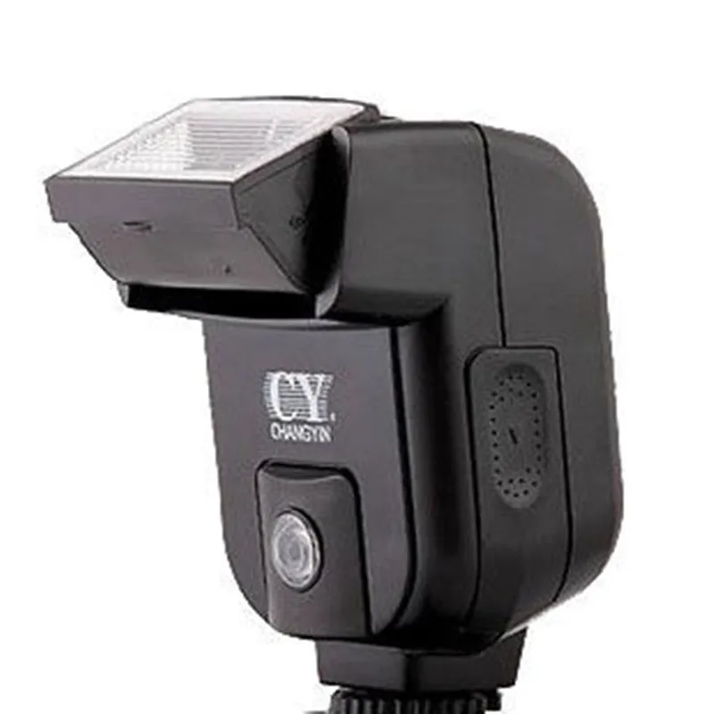 Compact silver SLR camera flash with tilted head mounted on a camera hot shoe