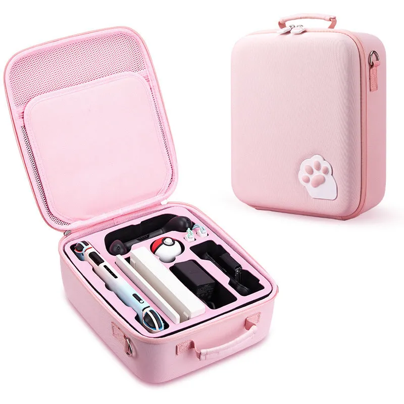 Pink Nintendo Switch storage bag with cat claw design, showing game cartridge slots and diagonal carry strap.