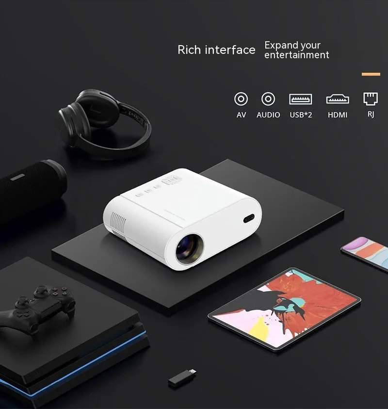 White Full HD smart Android projector with remote control on a table.