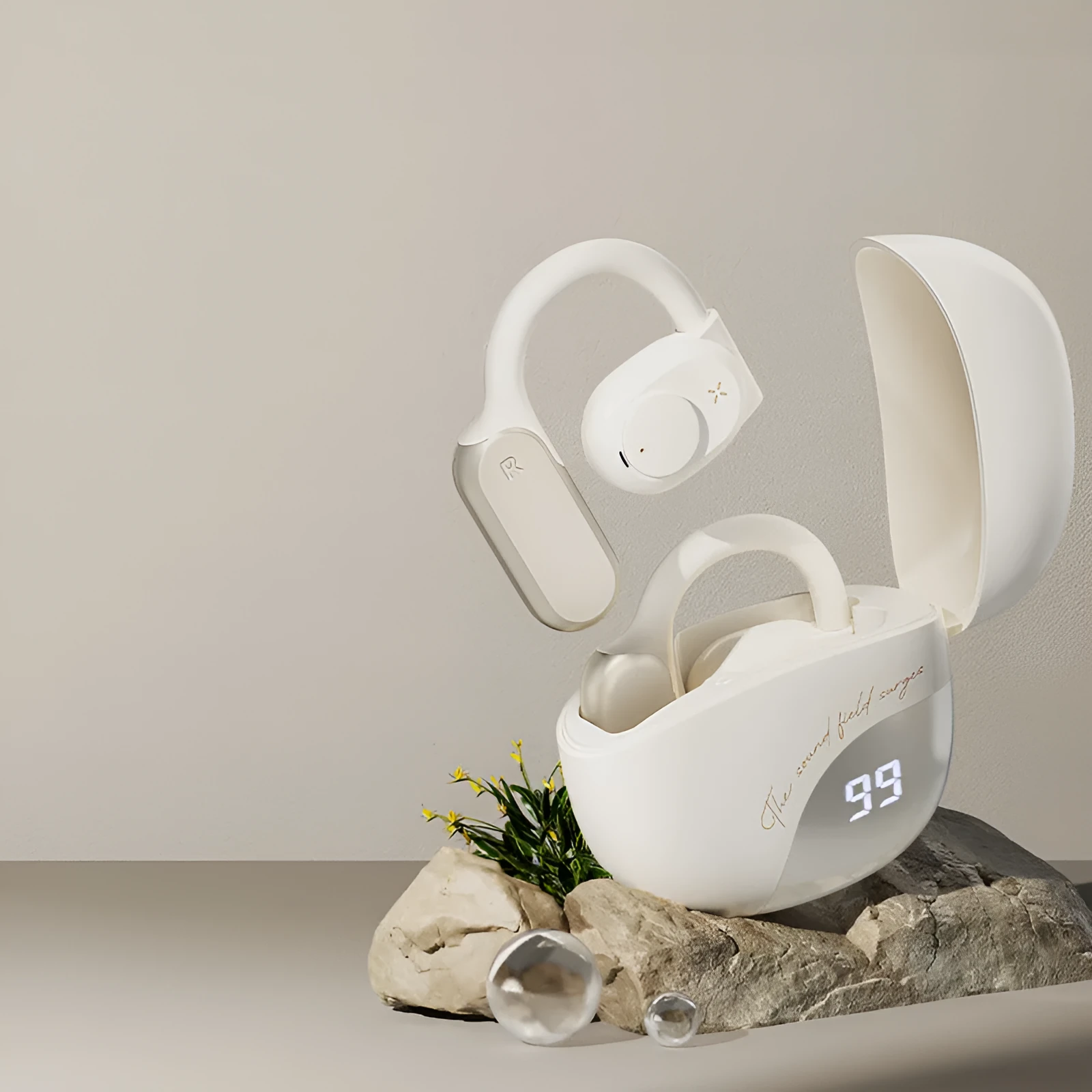Bone conduction non in-ear Bluetooth headset in Glacier Blue with silicone ear hook on a white background
