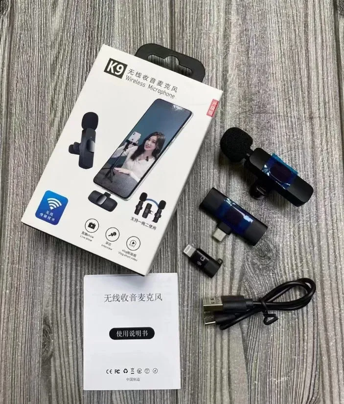 A wireless lavalier clip-on microphone attached to a shirt collar for hands-free video recording.