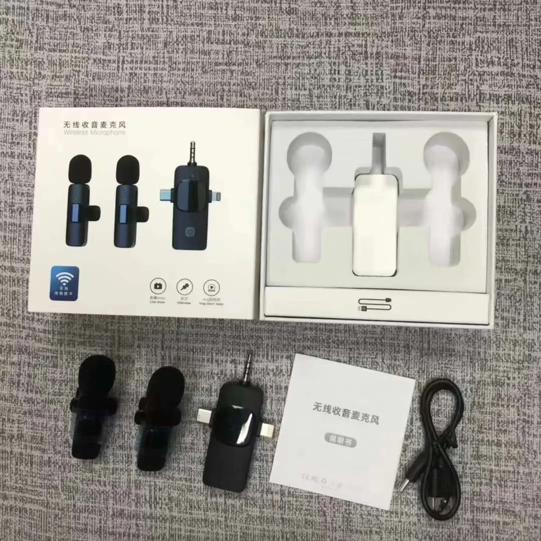 A wireless lavalier clip-on microphone attached to a shirt collar for hands-free video recording.