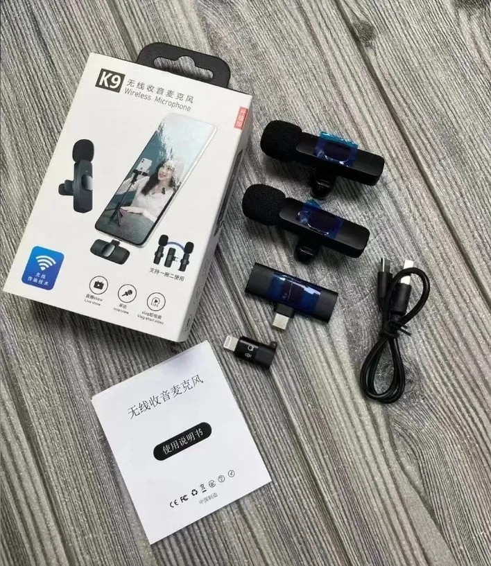 A wireless lavalier clip-on microphone attached to a shirt collar for hands-free video recording.