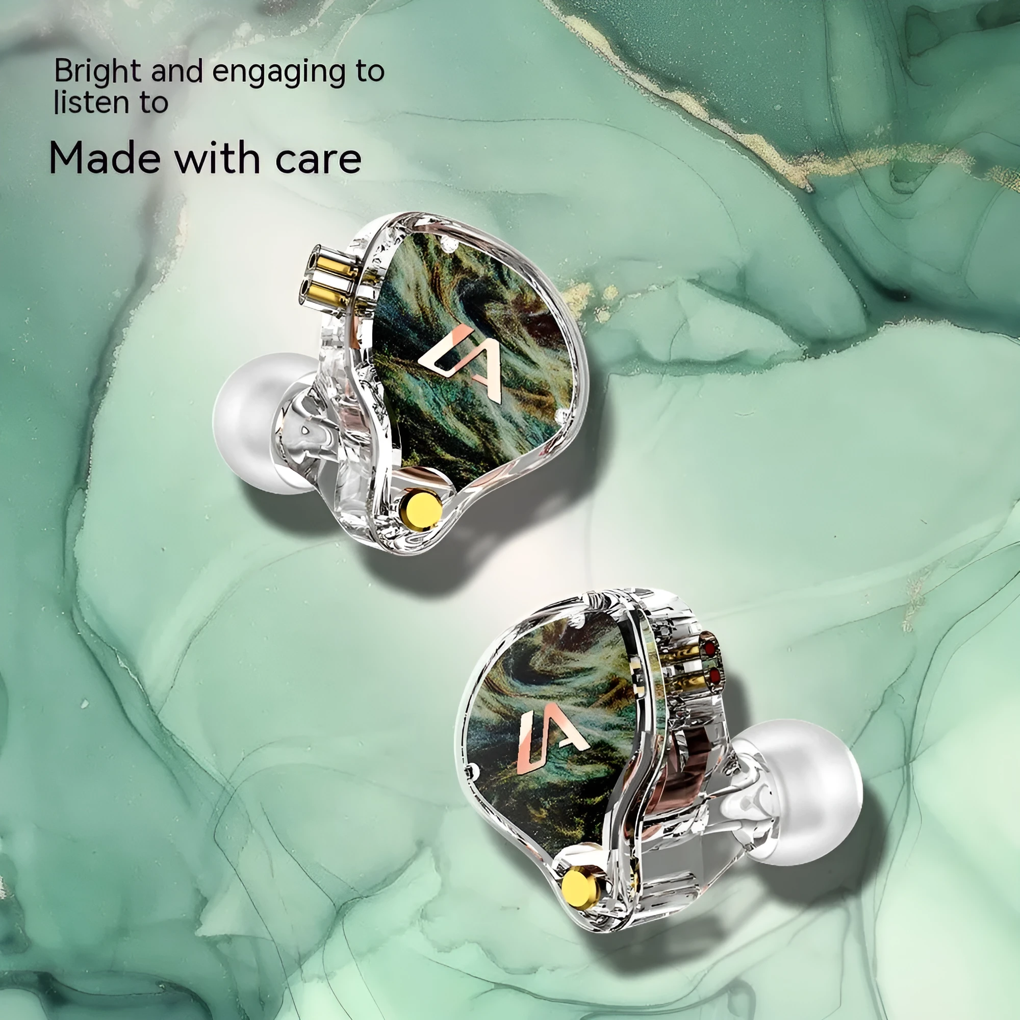 LM3 wired ear-mounted headphones with adjustable ear hook, silver-plated cable, and 3.5mm plug on a white background