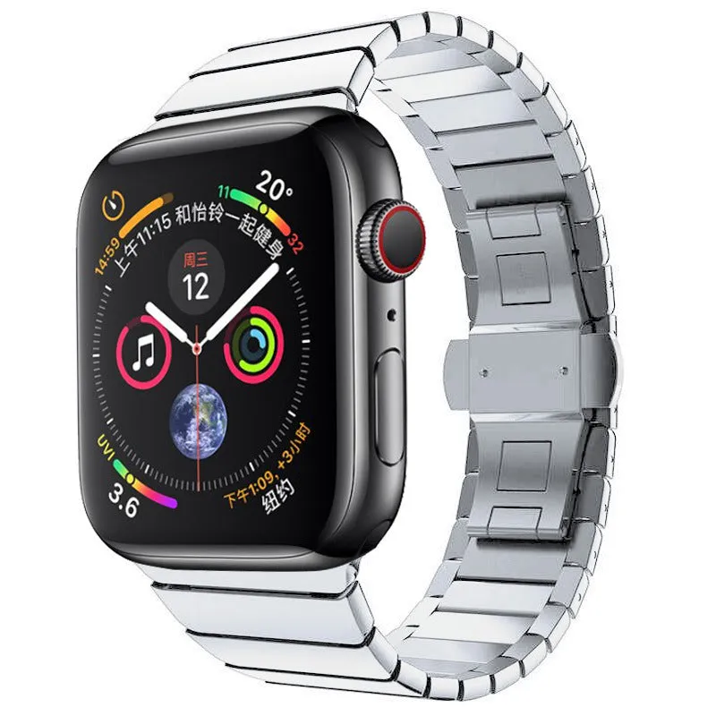 Silver metal Apple Watch strap with butterfly buckle on a 40mm watch case.