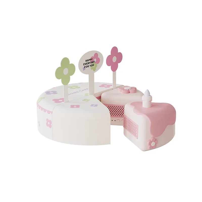 Maktoub Split Ring Cake Bluetooth Speaker in Pink and Violet colours, silicone and ABS build, creative gift for couples